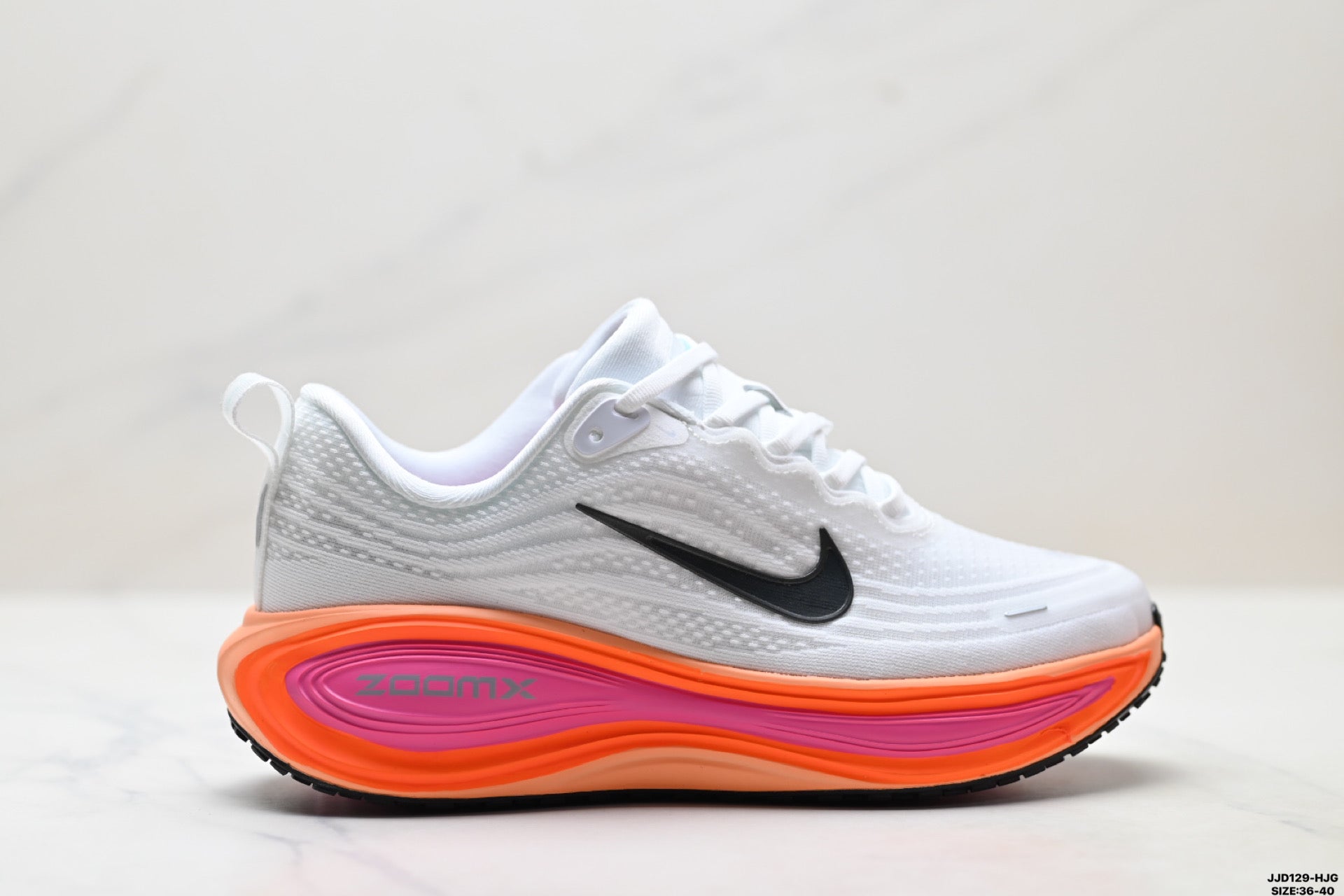Nike Vomero Plus Women's Low-Top Running Shoe HV8154-104