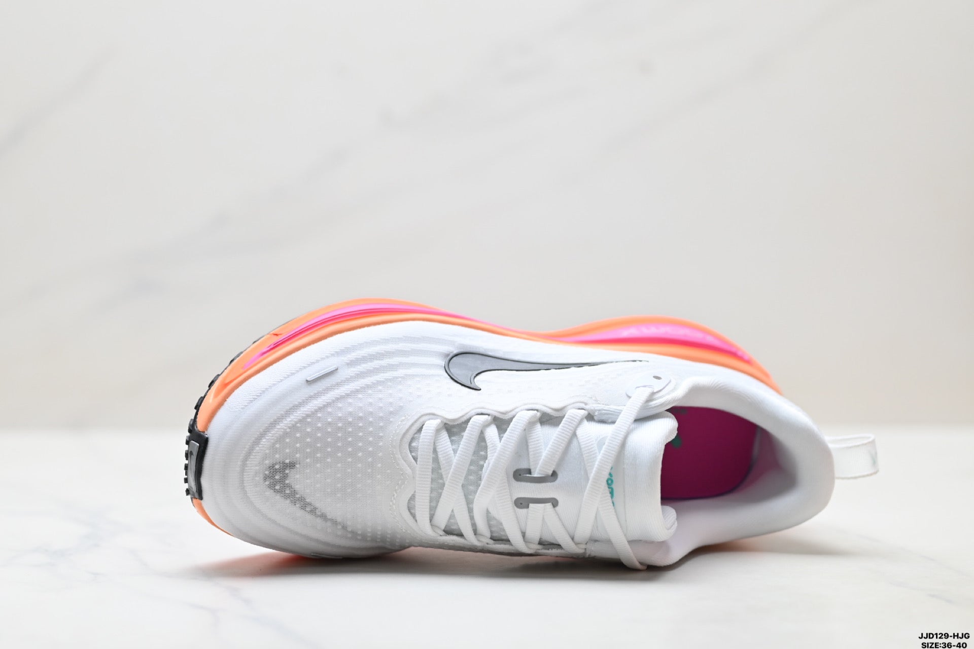 Nike Vomero Plus Women's Low-Top Running Shoe HV8154-104