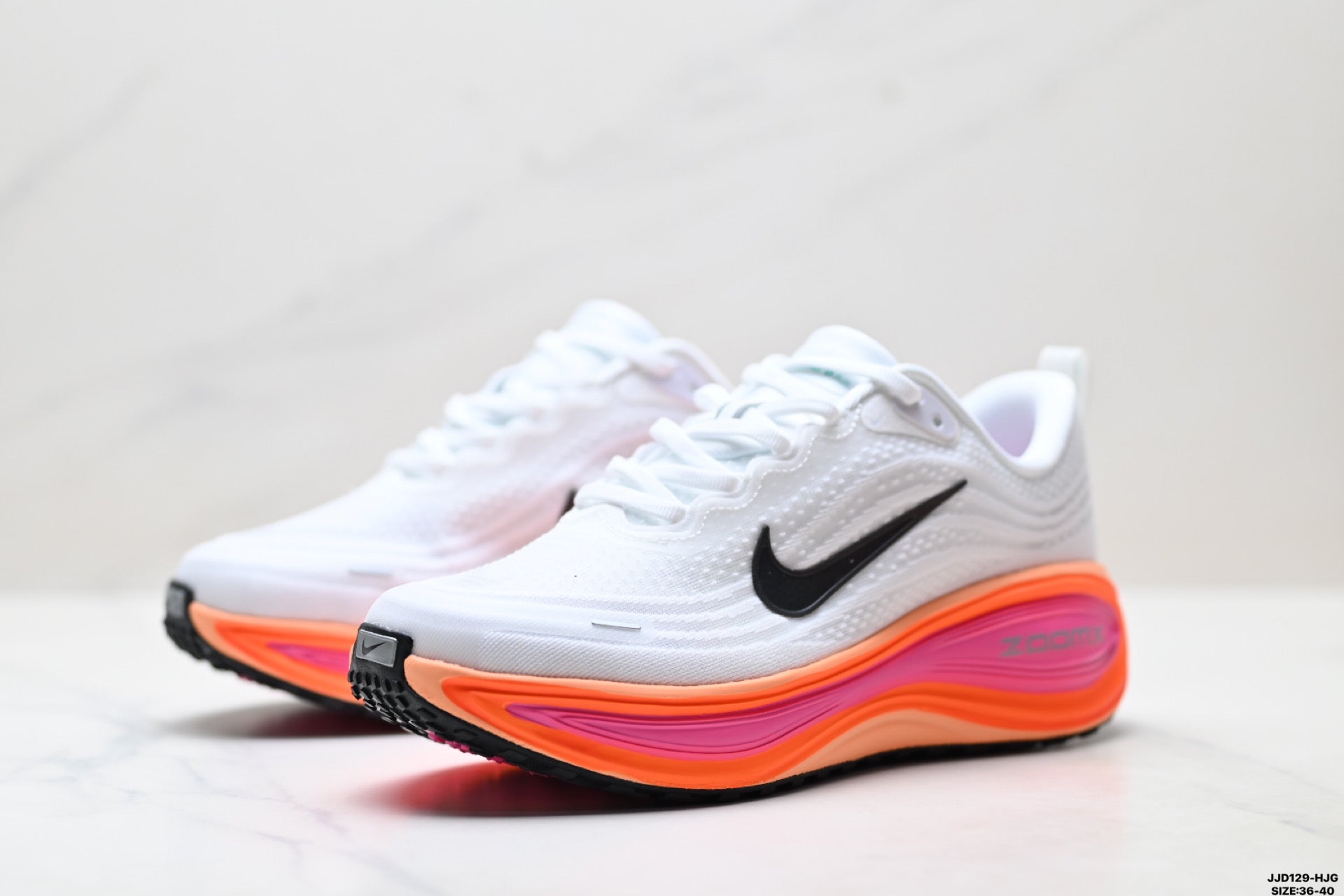 Nike Vomero Plus Women's Low-Top Running Shoe HV8154-104