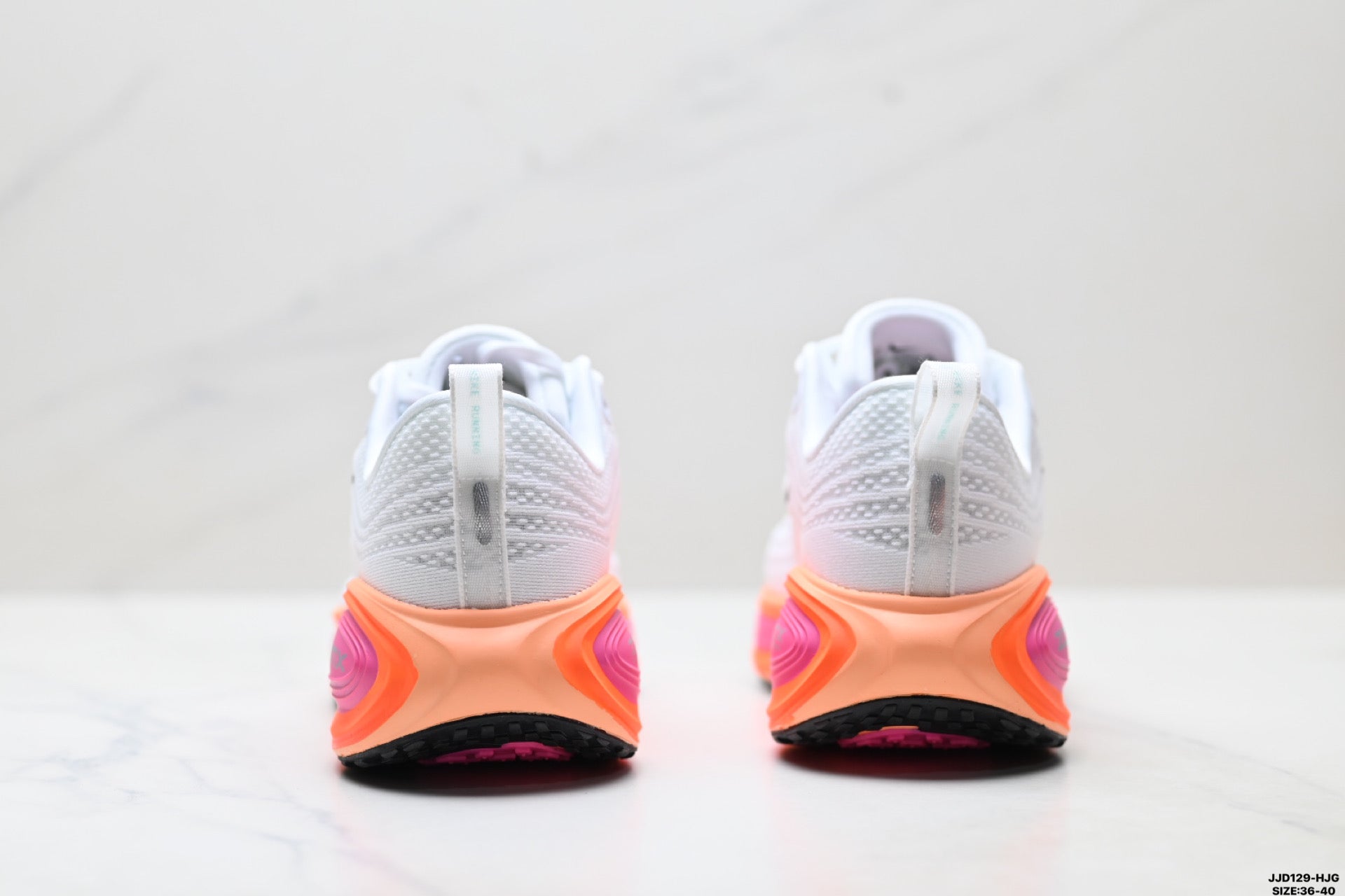 Nike Vomero Plus Women's Low-Top Running Shoe HV8154-104