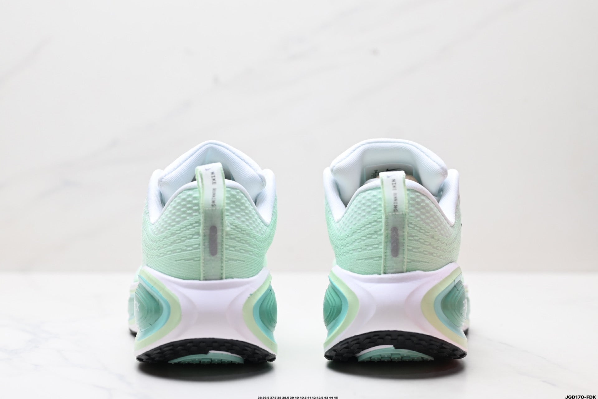 Nike Vomero Plus Low-Top Running Shoe HM6805-101