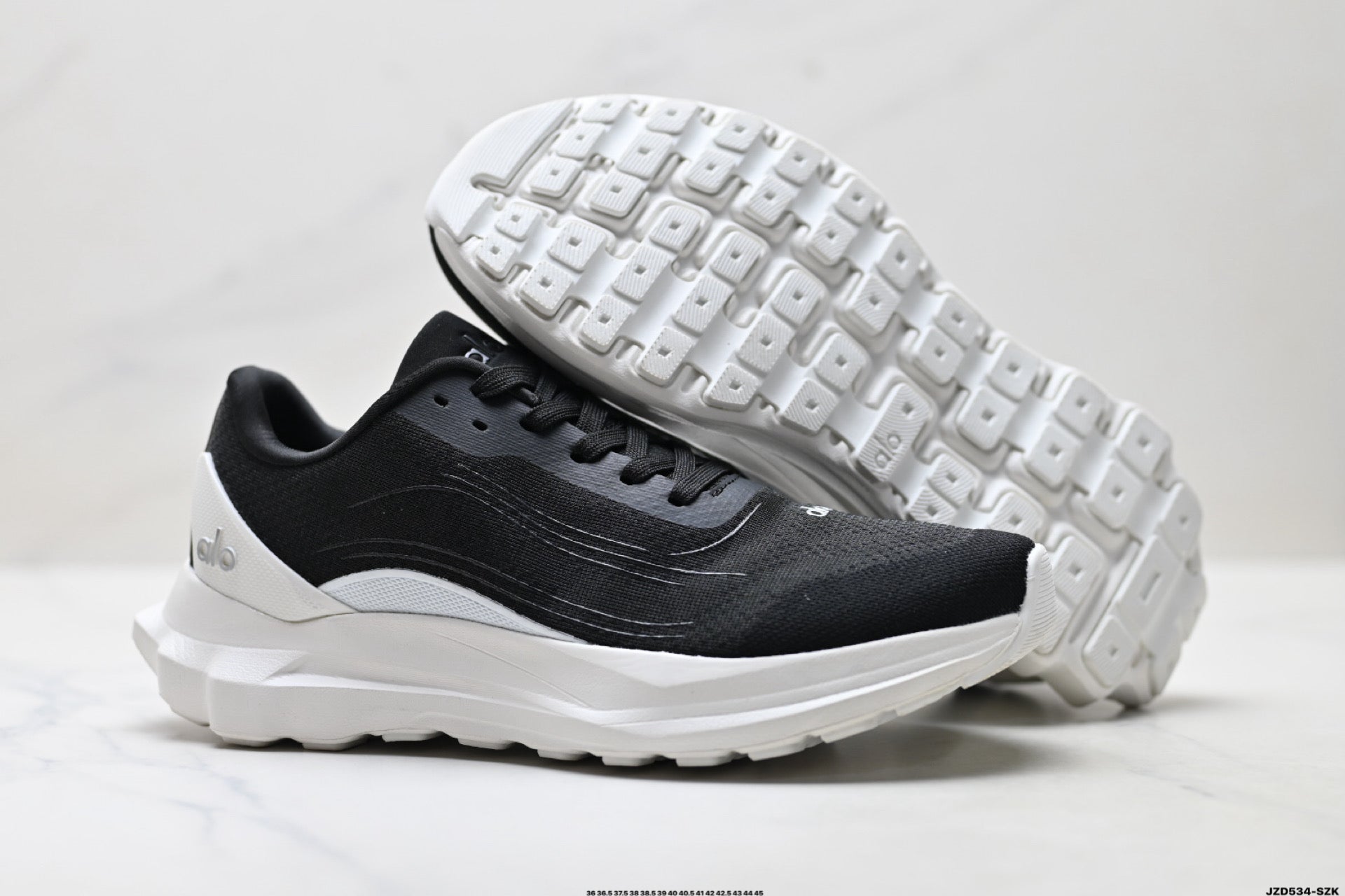 Alo Yoga Alo Runner – Breathable Mesh Low-Top Sneaker | City Commute & Training Black and White