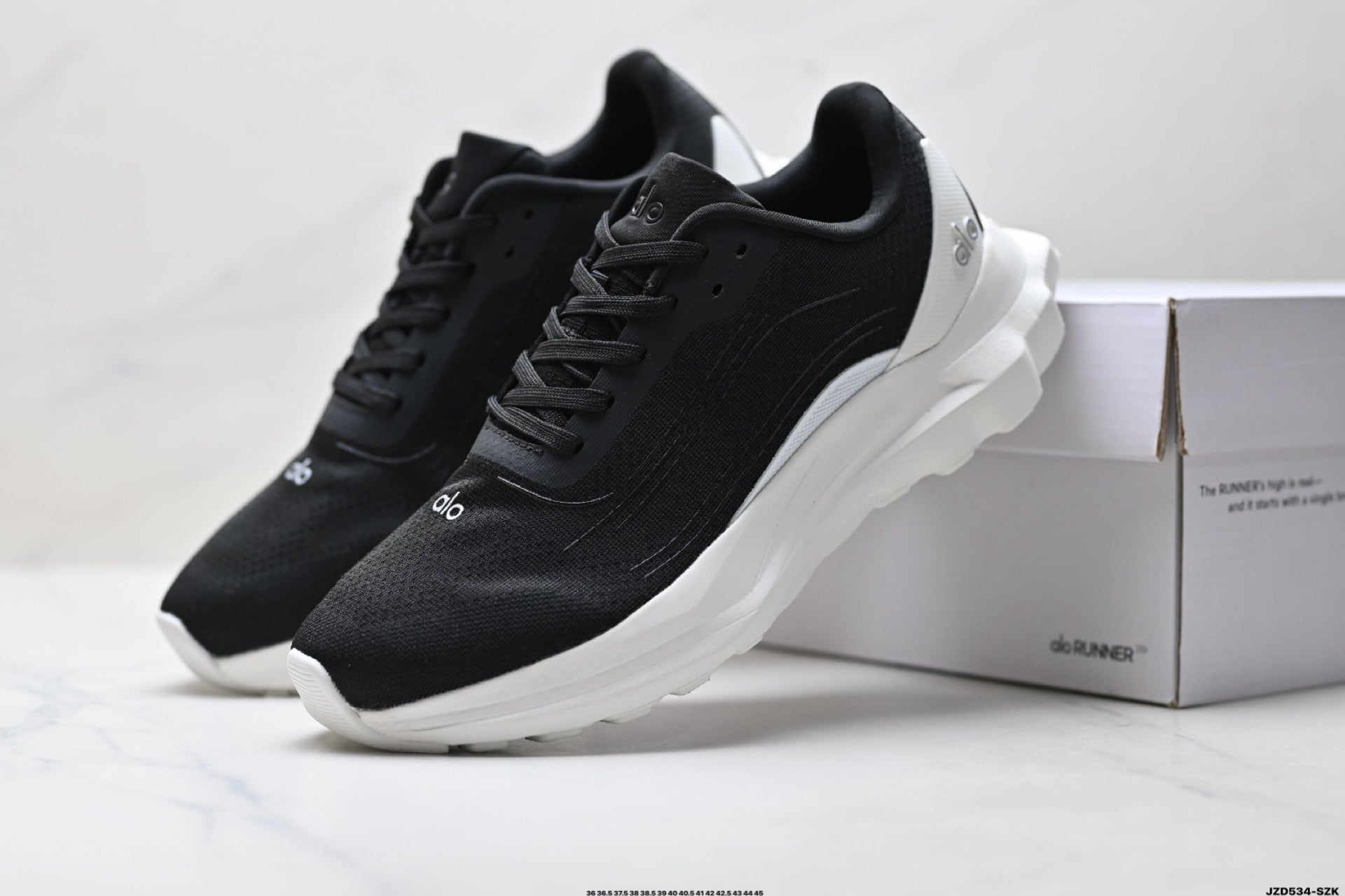 Alo Yoga Alo Runner – Breathable Mesh Low-Top Sneaker | City Commute & Training Black and White
