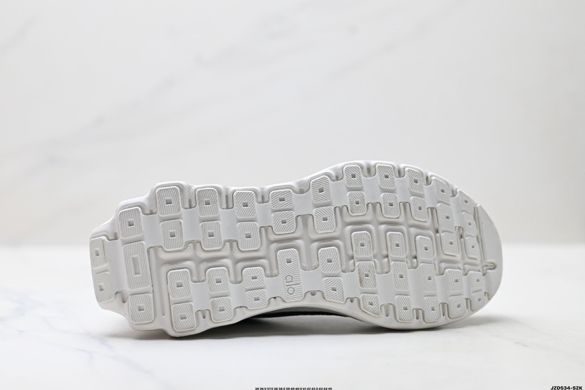 Alo Yoga Alo Runner – Breathable Mesh Low-Top Sneaker | City Commute & Training Black and White